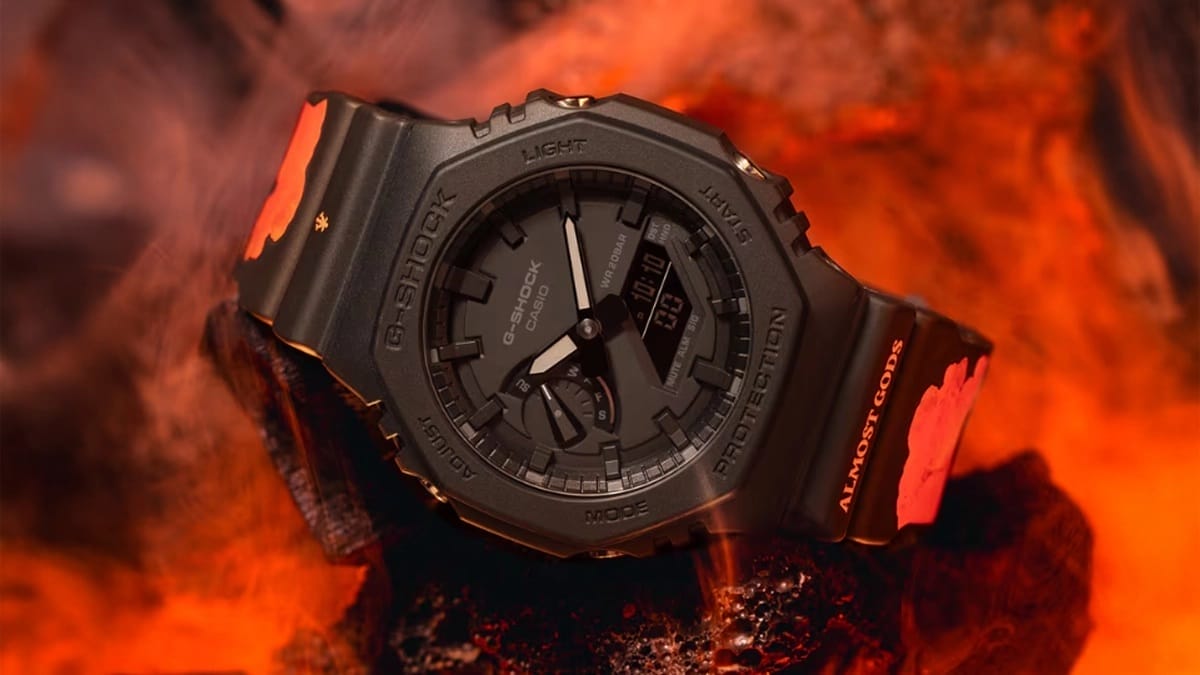 Casio G-Shock GA2100 black analog-digital watch with orange accents on volcanic rock — best G-Shock watch for men 2026