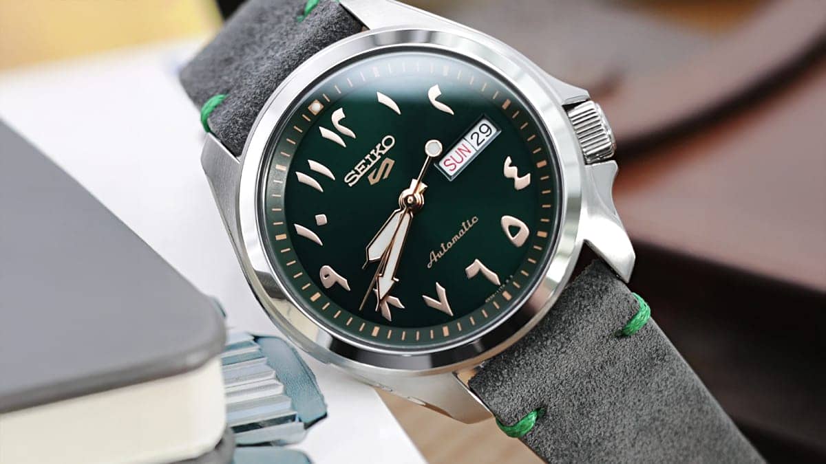 Seiko Arabic dial watches Seiko 5 Sports automatic green numeral dial grey suede strap rose gold hands day-date 2026